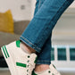 WHITE TRAINER WITH GREEN STRIPE