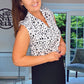 BLACK AND WHITE ANIMAL PRINT SLEEVELESS BLOUSE