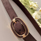 NARROW BROWN STRETCH BELT with gold buckle