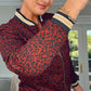 RUST LEOPARD PRINT BOMBER