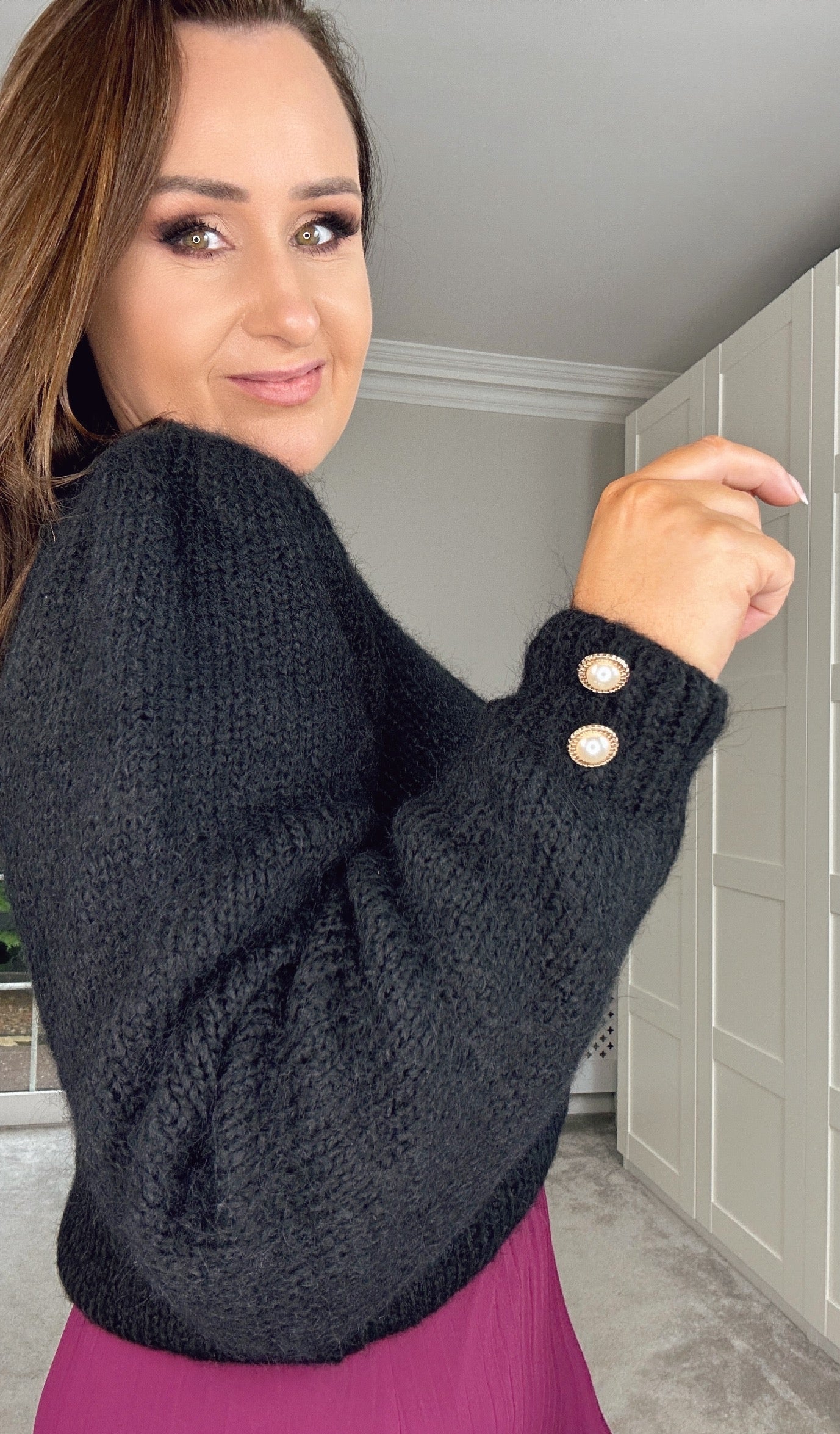 BLACK ONLY JUMPER with Pearl Button Cuff Detail
