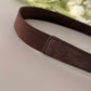 NARROW BROWN STRETCH BELT with gold buckle