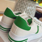WHITE TRAINER WITH GREEN STRIPE